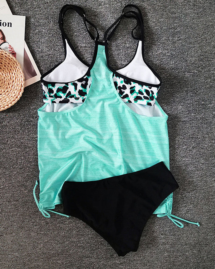 Carmina | Tankini de color sólido con estampado de panteras