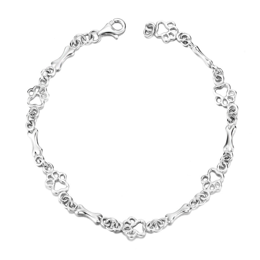 Liora™ | Pulsera con Encanto de Patita y Hueso