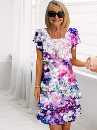 Vera | Vestido elegante fluido con volantes