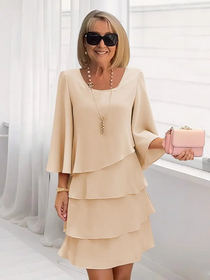Inés | Vestido elegante y fluido con volantes