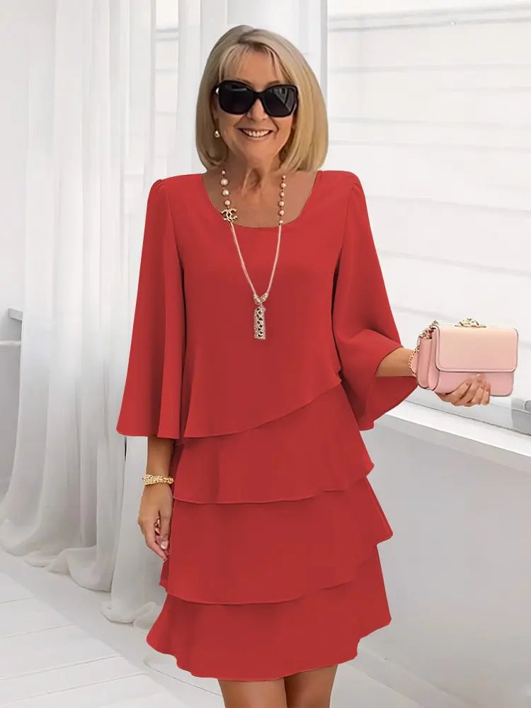 Inés | Vestido elegante y fluido con volantes